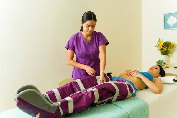 Therapist Giving Pressotherapy Woman Customer Lying Relaxing While Getting Massage — Stock Photo, Image