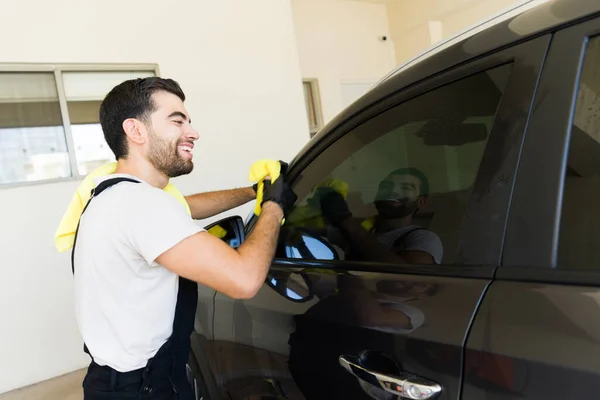 Happy Young Hispanic Male Employee Finishing Auto Detailing Vehicle Work — Stock Photo, Image