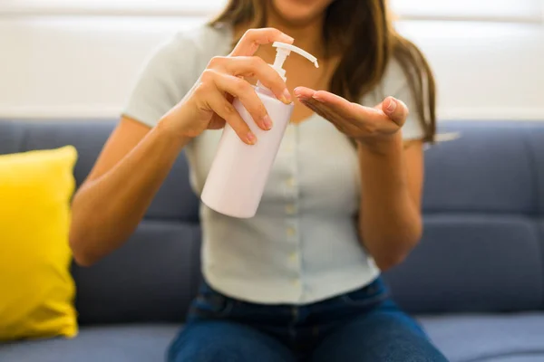 Latin Young Woman Applying Hand Lotion Using Mock Product Copy — Stock Photo, Image