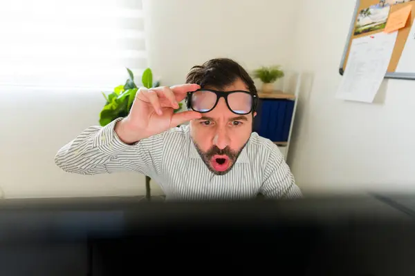 Excited Latin Man Feeling Surprised Using Glasses While Working Looking — Stock Photo, Image
