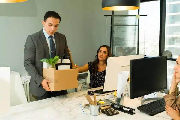 Businessman Taking His Stuff Leaving Office While Others Watch Him — Stock Photo, Image