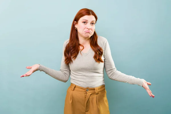 Redhead Caucasian Woman Blue Background Shrugging Her Shoulders Answer Question — Stock Photo, Image
