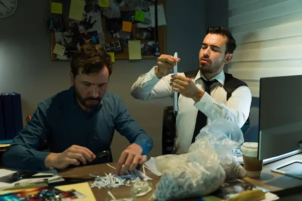 Two Investigators Examining Shredded Pieces Paper Trying Find New Clues — Stock Photo, Image