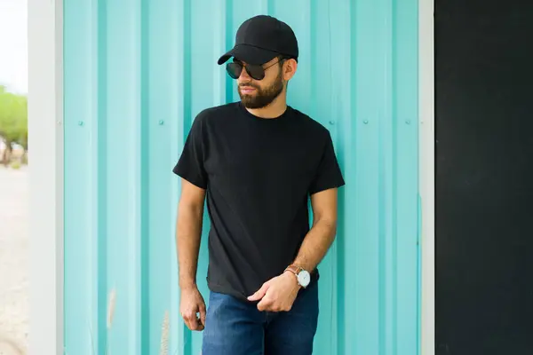Handsome Latin Man Wearing Blank Black Shirt Cap Posing Turquoise Stock Picture