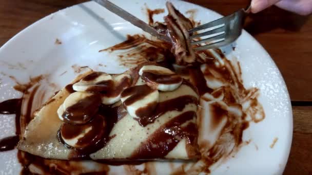 Girl Eats Pancakes Chocolate Bananas — Vídeo de stock