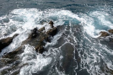 Top view of the rocky coast in the Atlantic Ocean