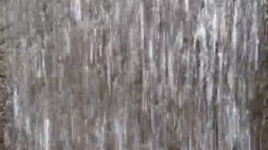 Background of falling water down. Beautiful waterfall