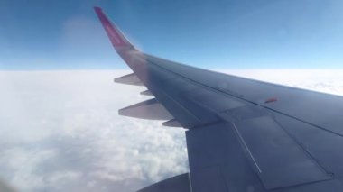 Katowice, Poland, November 22, 2022: view from the window of a flying plane to the sky