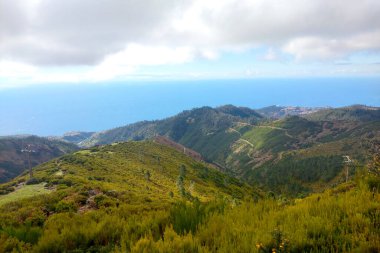 The green slopes of the mountains on an island in the Atlantic Ocean