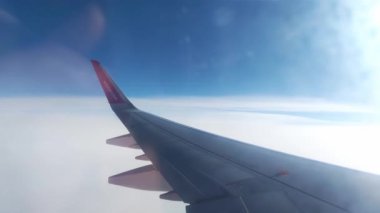 Katowice, Poland, November 22, 2022 Airplane flying over the clouds