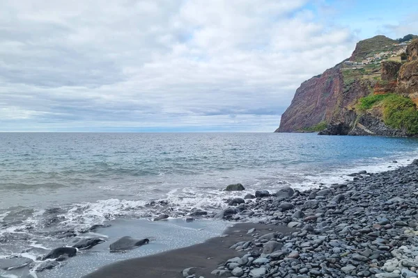 The promenade of the island of Madeira. Volcanic rock of the island