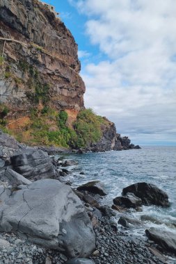 The slopes of the island of Madeira in the ocean. Beautiful background of nature