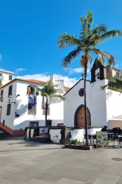 Madeira, Portugal, November 24, 2022: beautiful bright houses and cute streets of the tourist city of Funchal, Madeira