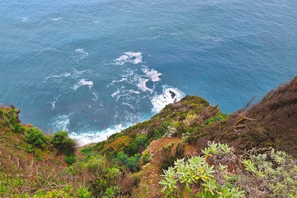 stock image View from a height of the mountainside and the sea. A dangerous cliff