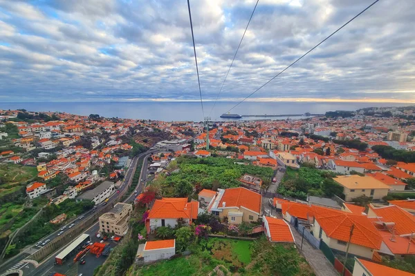 View from the cable car to the rooftops of houses in Funchal