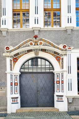 Gorlitz, Germany, April 13, 2024: Ornate Art Nouveau Doorway with Vibrant Motifs and Historical Architecture. clipart