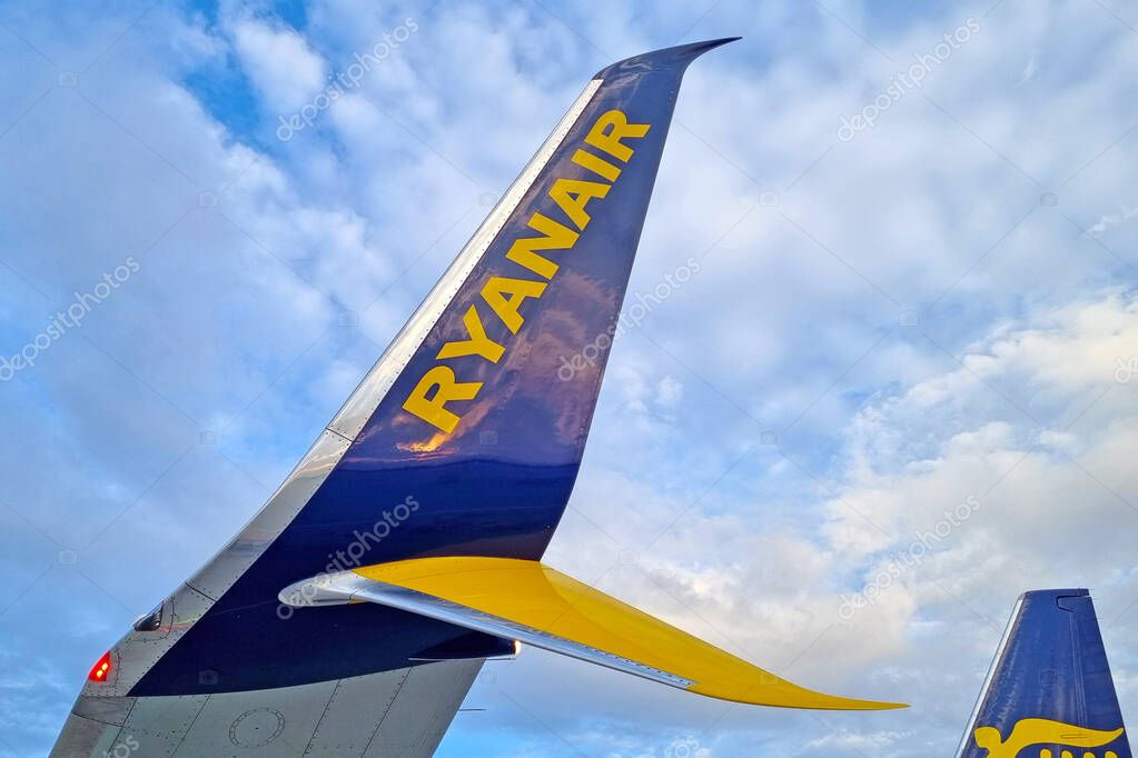Paris, France, July 26, 2025: Ryanair aircraft tail with distinctive branding set against a vibrant blue sky. the crisp colors and sleek design symbolize modern aviation, travel opportunities, and the airline industrys dynamic nature.