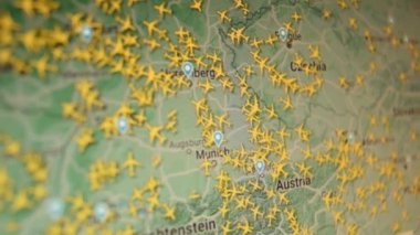 Airplanes air traffic over Central Europe no planes over Ukraine Camera shot of a computer screen. Moving camera shot of a computer screen.  flight paths of airplanes position changing flight radar. Countries, continents.