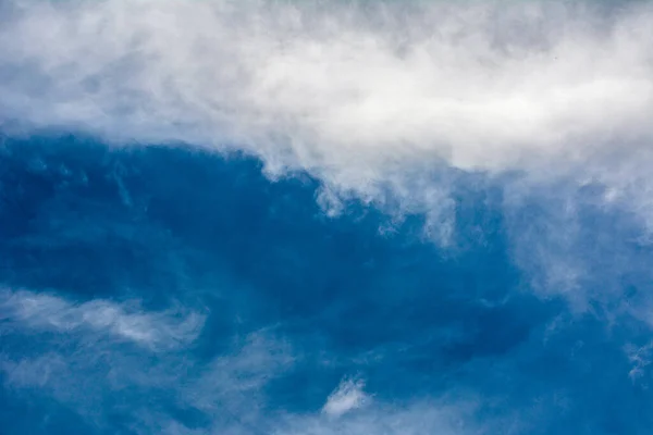 Clouds with blue sky .Cloud sky beautiful with blue and white clouds background on daylight .Natural daylight and white clouds floating on blue sky
