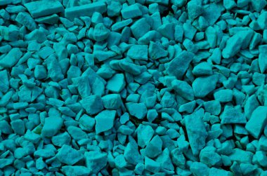 Doku arkaplanı: Taş çakıl taşları, küçük, pürüzsüz çakıl taşları. Doğal taş turkuaz renk çakıl taşı malzeme dokusu arka plan