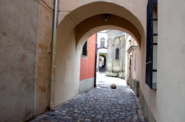 Lviv, Ukraine - August 2022.Old Armenian Cathedral of the Assumption of Mary in Lviv . Armenian courtyard at dawn. Architectural landmark in the center of Lviv.