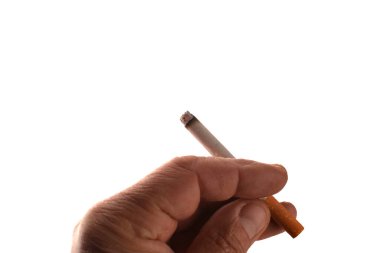 A Cropped of man hand holding cigarette pointing up against white background. A cigarette in a hand, isolate hand and cigarette, cigarette white background .