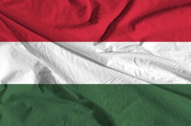 a close-up of the Hungarian flag fluttering in the wind .Waving national flag of Hungary.