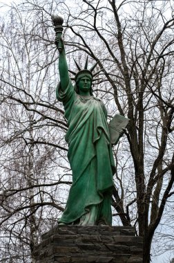 Zdolbuniv, Rivne region, Ukraine. January 2023. A replica of the Statue of Liberty near the office of the Volyn Cement Company's Dickerhoff joint-stock company.