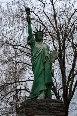 Zdolbuniv, Rivne region, Ukraine. January 2023. A replica of the Statue of Liberty near the office of the Volyn Cement Company's Dickerhoff joint-stock company.