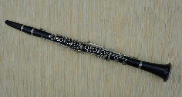 Close-up Of Clarinet Isolated On White Background.Close-Up Of Clarinet On Table.Close up of a clarinet music instrument.