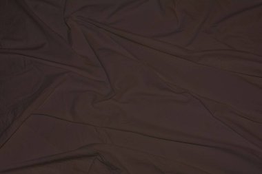 Arkaplan ve tasarım çalışmaları için kumaş dokusu, güzel buruşuk ipek ya da keten deseni. Yağmurluğun her renginde renkli kumaş. Buruşuk kumaşın dokusu..