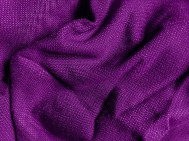 İpek kumaş. Dalgalı kumaş dokusu. Yüksek kaliteli fotoğraf. Doğal kumaş dokusu arka planı..