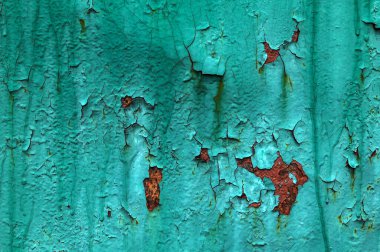 Eski paslı metalin dokusu soyulmuş turkuazla (mavi, yeşil) kaplıdır. Tasarım için arkaplan.
