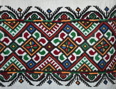 Ukrayna halk dekoratif nakışı. Ukrayna nakışı süsü. Geleneksel Ukrayna halk sanatı örnekleri tekstil kumaşına nakış işledi.