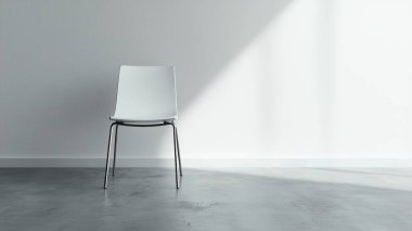 Modern bir iç mekanda minimalist beyaz bir sandalyenin yer aldığı sakin bir sahne. Doğal ışık, beton zeminde yumuşak bir gölge oluşturur ve sakin bir atmosfer yaratır..