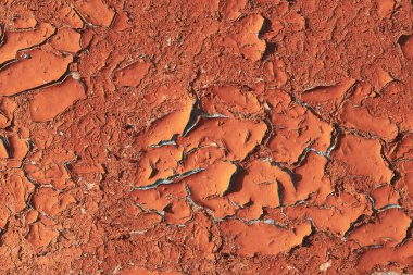 Duvardaki eski çatlak yağlı boya dokusu. Yakın plan..