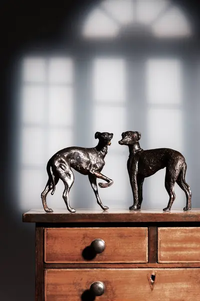 Antique Bronze Greyhound Dogs Standing Top Mahogany Cabinet — Stock Photo, Image