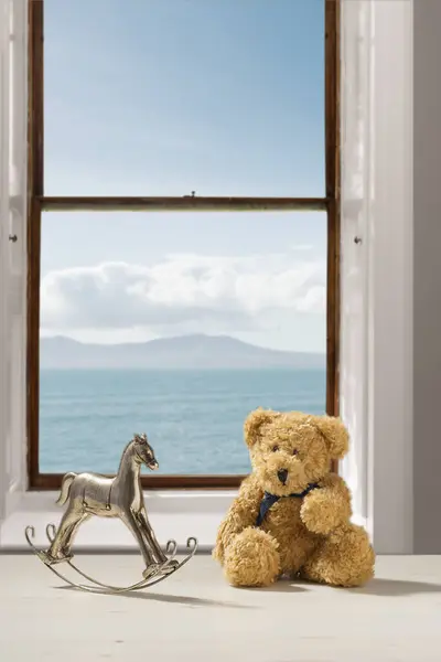 Little Toys Sitting Window Overlooking Ocean — Stock Photo, Image