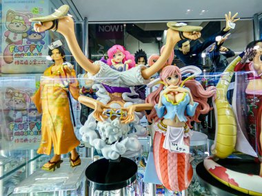 Popüler çizgi film ve animasyon dizilerinden ünlü karakter figürleri. Seçici bir odak noktasında halka gösterilmiştir.