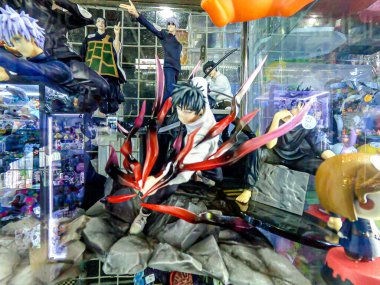 Popüler çizgi film ve animasyon dizilerinden ünlü karakter figürleri. Seçici bir odak noktasında halka gösterilmiştir.