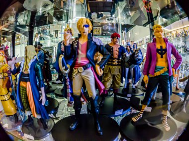 Farklı stillerde Japon plastik oyuncak bebekleri, MIXT Chatuchak 'ta alıcılar için hatıra koleksiyonu olarak satılıyor. Bangkok, Tayland. - 14 Ağustos 2025.