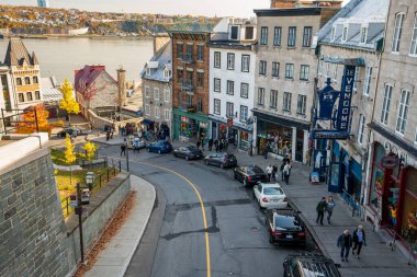 Quebec, Canada - October 23 2022 : Quebec City Old Town in autumn. Restaurant and gift shop on Cote de la Montagne.
