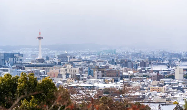 Kyoto City skyline panoramic view with snow in winter.