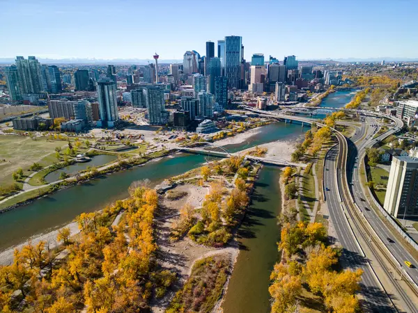 stock image Downtown Calgary skyline and Bow River in autumn season. Aerial view of City of Calgary, Alberta, Canada.