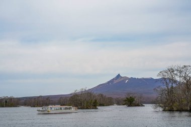 Hokkaido, Japan - April 30 2019 : Scenery view from Lake Onuma with Mt. Hokkaido Koma-ga-take in background. Onuma Quasi-National Park. Town Nanae, Oshima Subprefecture