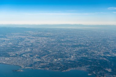 Aerial view of Shonan region in sunrise time with blue sky horizon background, Kanagawa Prefecture, Japan clipart