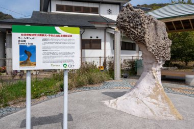 Mine, Yamaguchi, Japan - April 6 2024 : Monument of Queen's head replica of Taiwan Yehliu Geological Park. Commemorating the conclusion of the academic exchange agreement, Mine City, Japan. clipart
