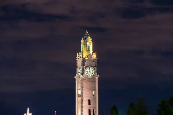 stock image Old Port of Montreal Clock Tower illuminated at night. Montreal, Quebec, Canada.