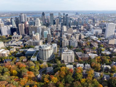 Aerial view of Downtown Montreal city skyline panorama in autumn sunny day. Mount Royal, Montreal, Quebec, Canada. clipart