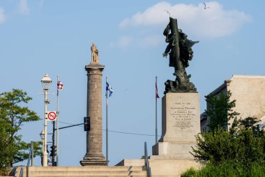 Nelson Monument (Nelson's Column) and Jean Vauquelin Monument in Old Montreal. Montreal, Quebec, Canada. clipart